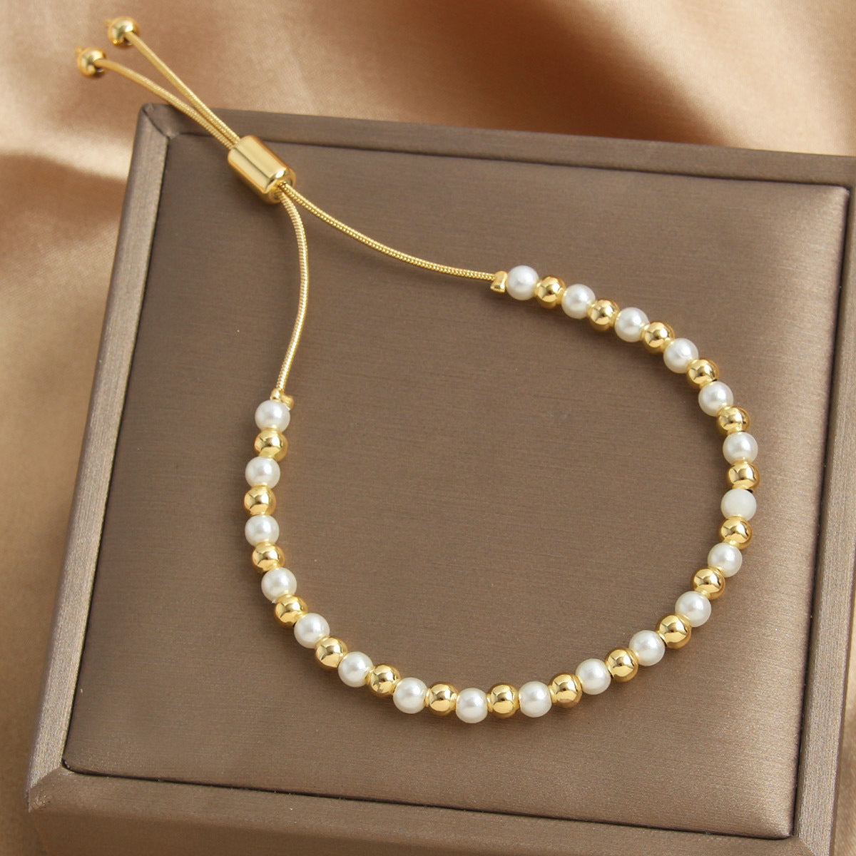 Retro-style Pearl Bracelet With A Pull-chain Design Available In Multiple Sizes And Fully Adjustable